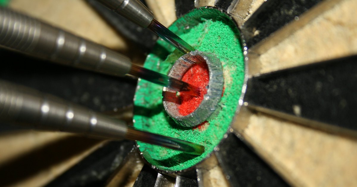 Darts on TV: three darts in the bull of a dartboard